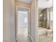 Hallway leading to bedroom and bathroom with a view of the glass enclosed shower at 4052 Compass Rose Way, Las Vegas, NV 89108