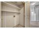 Functional laundry area with shelving, an electrical outlet, and convenient access to storage space at 4052 Compass Rose Way, Las Vegas, NV 89108