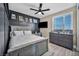 This bedroom features a ceiling fan, TV, a window, and a dresser with decor at 460 Pear Lake St, Las Vegas, NV 89138
