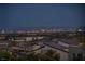 Stunning city skyline view at night from rooftop homes at 460 Pear Lake St, Las Vegas, NV 89138