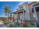 Contemporary home with a covered front porch and well-manicured landscaping at 460 Pear Lake St, Las Vegas, NV 89138