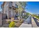 Attractive home exterior with a covered patio and beautifully landscaped yard at 460 Pear Lake St, Las Vegas, NV 89138