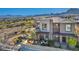 Stunning view of new construction townhouse in a desert community with a beautiful terrace and stone accents at 460 Pear Lake St, Las Vegas, NV 89138
