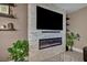 Modern fireplace with stone veneer and shelving at 460 Pear Lake St, Las Vegas, NV 89138