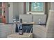 Cozy outdoor seating area with a fire pit and champagne at 460 Pear Lake St, Las Vegas, NV 89138