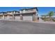 Modern home featuring a spacious two-car garage and well-maintained landscaping at 460 Pear Lake St, Las Vegas, NV 89138