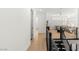 Upstairs hallway showcasing modern railing, natural light, and inviting access to the living spaces at 484 Windstone Crest Ave, Las Vegas, NV 89138