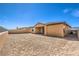 View of the backyard showing space for a pool and a desert-style yard ready for personalization at 522 Copper Falcon Ave, Henderson, NV 89011