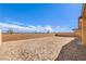 Expansive backyard with brick perimeter walls awaiting landscaping, ready for customization at 522 Copper Falcon Ave, Henderson, NV 89011