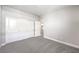Bedroom with carpet, neutral walls, and a triple door closet at 522 Copper Falcon Ave, Henderson, NV 89011