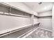 A walk-in closet featuring shelving and hanging rods offers ample storage space at 522 Copper Falcon Ave, Henderson, NV 89011