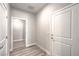 Hallway with doors and light wood flooring at 522 Copper Falcon Ave, Henderson, NV 89011
