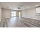 Spacious living room offers an open floor plan with sliding glass doors for ample natural light at 522 Copper Falcon Ave, Henderson, NV 89011