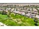 Aerial view of a community featuring well-manicured lawns and desert landscaping at 5260 Acqua Ln, Pahrump, NV 89061