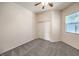 Cozy carpeted bedroom featuring ample closet space and a bright window at 5260 Acqua Ln, Pahrump, NV 89061