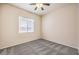 Bedroom offering ample natural light with contemporary ceiling fan at 5260 Acqua Ln, Pahrump, NV 89061
