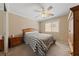 Cozy bedroom featuring carpet floors, a ceiling fan, and a double bed creating a relaxing retreat at 5310 Eel River Ct, North Las Vegas, NV 89031
