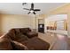 Spacious living room featuring hardwood floors, ceiling fan and an open layout at 5310 Eel River Ct, North Las Vegas, NV 89031