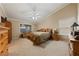 Spacious main bedroom with vaulted ceilings, a ceiling fan, and ample natural light creating a relaxing retreat at 5310 Eel River Ct, North Las Vegas, NV 89031