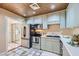 Well-appointed kitchen with stainless appliances at 590 Tam O Shanter, Las Vegas, NV 89109