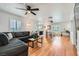 Spacious living room with hardwood floors, fireplace and neutral decor at 590 Tam O Shanter, Las Vegas, NV 89109