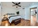 Comfortable bedroom featuring neutral tones and hardwood floors at 590 Tam O Shanter, Las Vegas, NV 89109