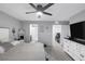 Spacious bedroom with a ceiling fan and soft, neutral colors at 6247 Milford Sound St, Las Vegas, NV 89148