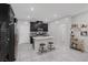This kitchen boasts a center island with bar stool seating and stainless steel appliances at 6247 Milford Sound St, Las Vegas, NV 89148