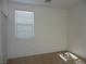 Bedroom with a bright window and plush carpet at 7649 Slide Rock Ave, Las Vegas, NV 89113