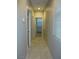 Hallway with tile flooring and neutral paint at 7649 Slide Rock Ave, Las Vegas, NV 89113
