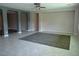 Open living area with tile flooring and arched openings, perfect for entertaining at 7649 Slide Rock Ave, Las Vegas, NV 89113