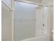 Bathroom with a shower and tub combination and sliding glass door at 8125 Turbys Treehouse Pl, Las Vegas, NV 89131