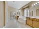 Main bath boasts a soaking tub, double sinks, and a separate dressing area at 8125 Turbys Treehouse Pl, Las Vegas, NV 89131