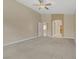 Spacious bedroom with neutral carpeting and ensuite bathroom access at 8125 Turbys Treehouse Pl, Las Vegas, NV 89131