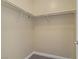 Walk-in closet with shelving and plush carpet, perfect for organizing your wardrobe at 8125 Turbys Treehouse Pl, Las Vegas, NV 89131