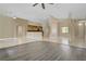 Expansive living area with tile and hardwood floors, abundant natural light at 8125 Turbys Treehouse Pl, Las Vegas, NV 89131