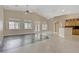 Bright, open living space featuring neutral tones, tile and wood flooring at 8125 Turbys Treehouse Pl, Las Vegas, NV 89131