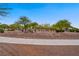 Scenic park featuring desert landscaping, walking paths and a variety of desert trees at 8125 Turbys Treehouse Pl, Las Vegas, NV 89131
