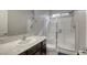 Bathroom featuring a glass shower, large mirror, and spacious vanity at 8137 Crushed Velvet Pl, Las Vegas, NV 89166