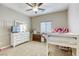 Cozy bedroom showcasing neutral walls, carpet, and a loft bed with a chest of drawers at 8137 Crushed Velvet Pl, Las Vegas, NV 89166