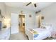 Bedroom featuring a single bed, neutral walls, carpet, and a ceiling fan at 8137 Crushed Velvet Pl, Las Vegas, NV 89166