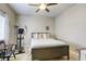 Comfortable bedroom with neutral tones and a ceiling fan at 8137 Crushed Velvet Pl, Las Vegas, NV 89166