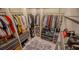 Bright walk-in closet with custom shelves, a center island, and plenty of storage for clothes and accessories at 8310 W Camero Ave, Las Vegas, NV 89113