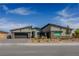 Beautiful single-story home featuring a modern design, desert landscaping, and a two-car garage at 8310 W Camero Ave, Las Vegas, NV 89113