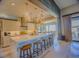 Modern kitchen with marble countertops, stainless steel appliances, and pendant lighting at 8310 W Camero Ave, Las Vegas, NV 89113