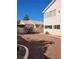 A well-kept, low maintenance backyard with gravel, desert landscaping and a privacy wall at 8788 Elise Ct, Henderson, NV 89074