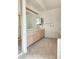 A bathroom featuring a double vanity, large mirror, and shower at 8788 Elise Ct, Henderson, NV 89074