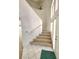 Inviting entryway featuring a staircase, tile flooring, and natural light at 8788 Elise Ct, Henderson, NV 89074