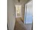 Neutral hallway with multiple entryways at 8788 Elise Ct, Henderson, NV 89074