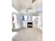 Living room with open archway to kitchen and fireplace at 8788 Elise Ct, Henderson, NV 89074